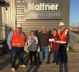 Blattner Energy donated $10,000 to Lemoore Christian Aid and God's Breadbox. L to R are Blattner Energy's Brian Cooper, Valerie Phelps, Nick Francu, Karen Christensen. 
